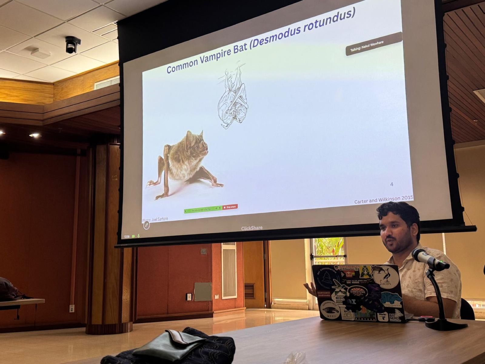 Nakul Wewhare presents research on common vampire bats at a seminar in Panama.