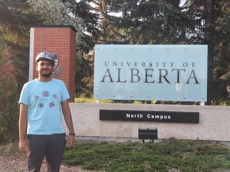 Nakul Wewhare stands beside the University of Alberta North Campus sign.